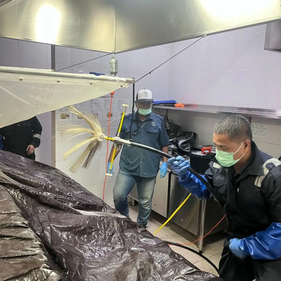 Technician performing scheduled preventive maintenance and condition monitoring